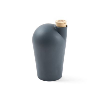 A single dark grey colored carafe with a cork stopper. The TUYO logo is lightly branded on the top of the cork stopper.