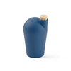 A single dark sea green colored carafe with a cork stopper. The TUYO logo is lightly branded on the top of the cork stopper.