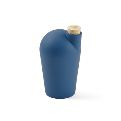 A single dark sea green colored carafe with a cork stopper. The TUYO logo is lightly branded on the top of the cork stopper.