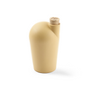 A single yellow carafe with a cork stopper. The TUYO logo is lightly branded on the top of the cork stopper.