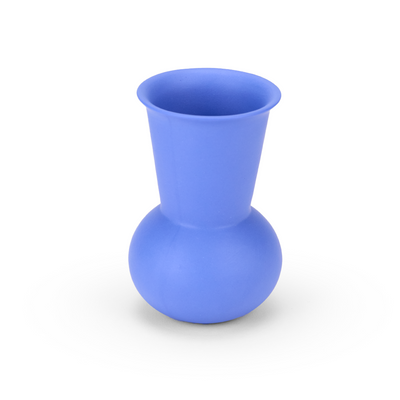 A three quarter view of a blue TUYO tequila sipping glass