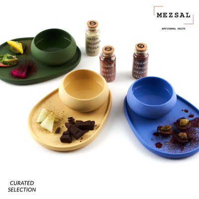 porcelain copitas and plates with mezsal artisanal salts:Cinna Beet, Umami Garden, Green Jalapeño