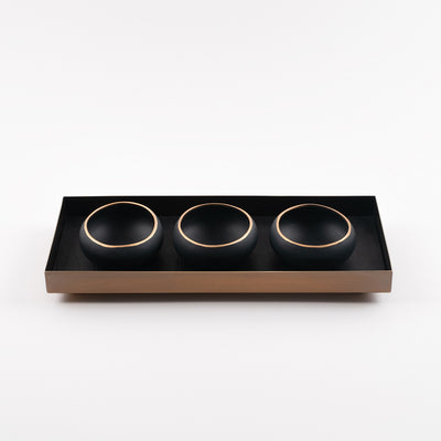 brass and black leather tray with porcelain copitas