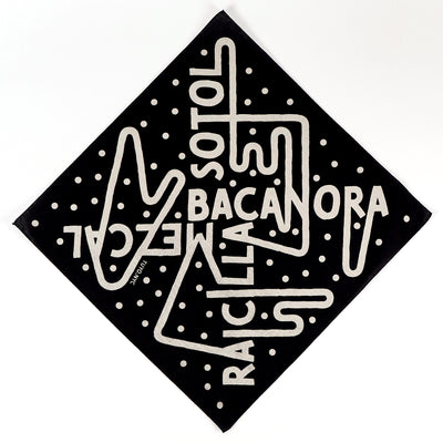 Black cotton bandana screen printed with the names of four Mexican Spirits: mezcal, sotol, raicilla, bacanora