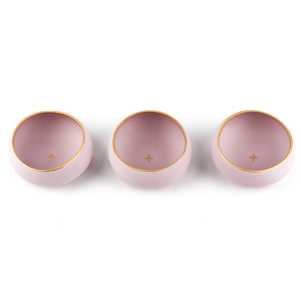 Set of three lavender and gold porcelain copitas