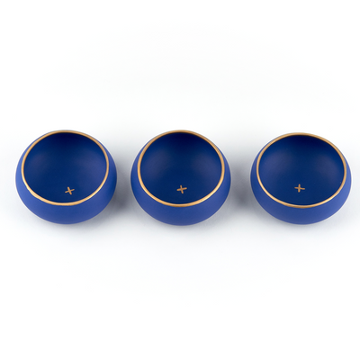set of three dark blue and gold copitas for drinking mezcal