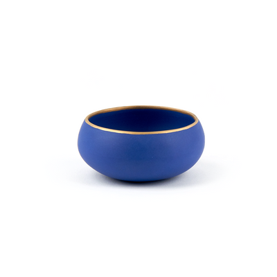 Side view of our mezcal copita in dark blue porcelain
