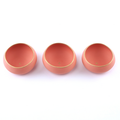 set of three melon and gold copitas for drinking mezcal