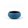 Side view of our mezcal copita in dark sea green porcelain
