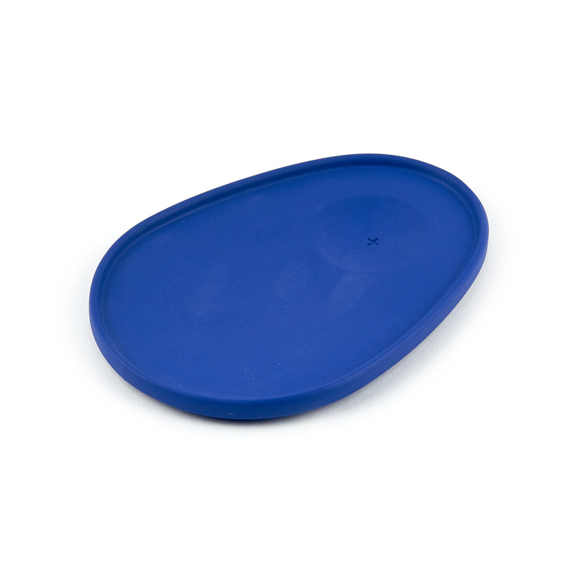 dark blue copita with a gold rim and dark blue pairing plate